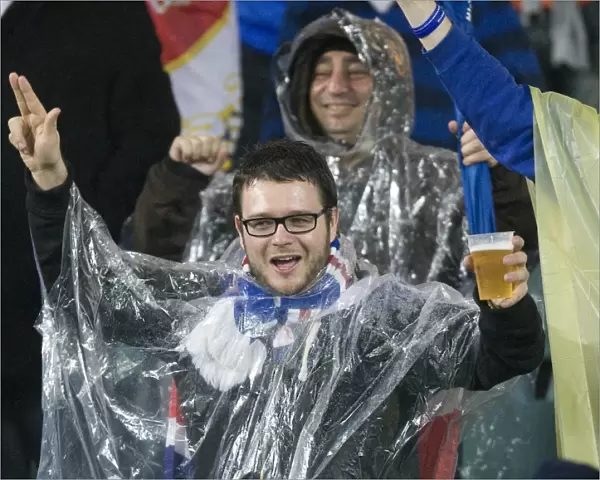 Rangers FC Fans Braving the Rain at Sydney Football Stadium during Sydney Festival of Football 2010: Unwavering Support Amidst the Downpour
