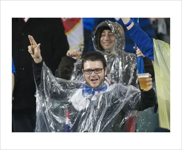 Rangers FC Fans Braving the Rain at Sydney Football Stadium during Sydney Festival of Football 2010: Unwavering Support Amidst the Downpour