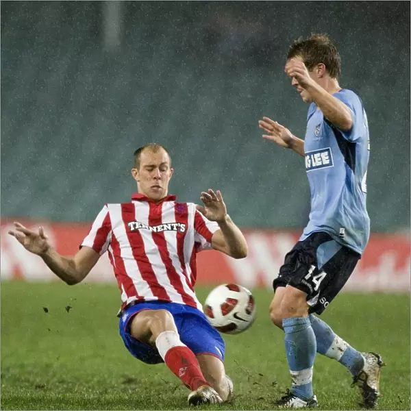Whittaker vs Brosque: Intense Tackle at Sydney Football Stadium - Rangers vs Sydney FC (Sydney Festival of Football 2010)