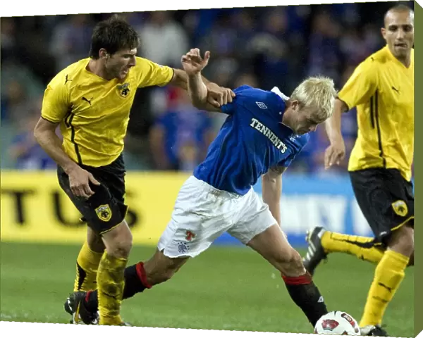 Rangers Steven Naismith Fouls by AEK Athens Ismael Blanco during Sydney Festival of Football 2010 Soccer Match