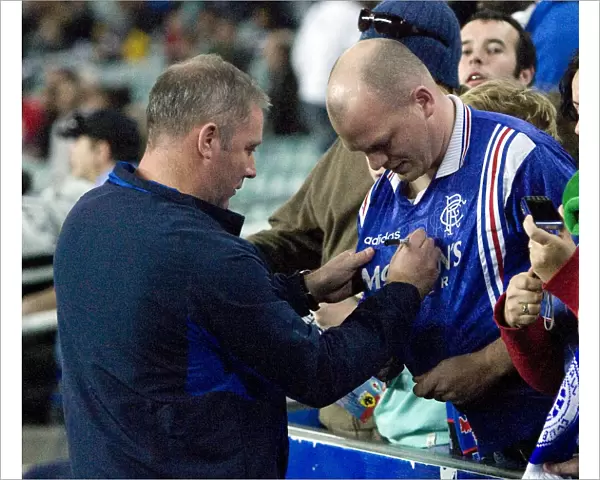 Ally McCoist Signs Rangers Fan's Shirt at Sydney Festival of Football 2010 vs AEK Athens