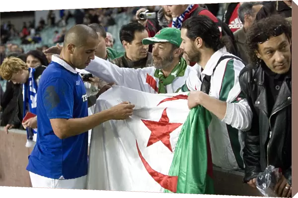 Rangers Bougherra Signs Algerian Flag after AEK Athens Clash at Sydney Football Stadium (Sydney Festival of Football 2010)