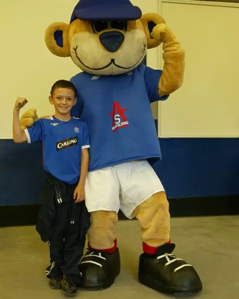 Ibrox Roars Pride: Rangers Triumphant 2-1 Victory Over Kilmarnock with Broxi and Ecstatic Fans