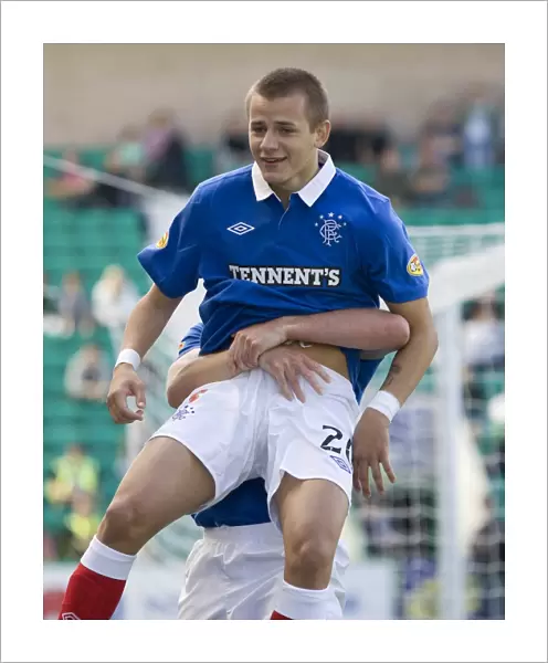 Kenny Miller's Double Delight: Rangers Triumph over Hibernian - Miller's Euphoric Double Celebration with Vladimir Weiss