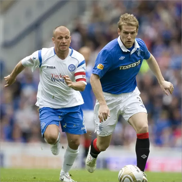 Stevie Davis vs Jody Morris: Intense Rivalry in Rangers vs St. Johnstone's 2-1 Clydesdale Bank Scottish Premier League Clash at Ibrox