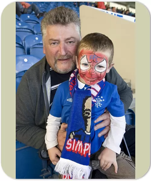 Rangers Andy Gilmour and Grandson Lewis Henges: A Heartwarming Moment of Celebration Amidst Rangers 4-0 Victory over Dundee United (Clydesdale Bank Scottish Premier League)