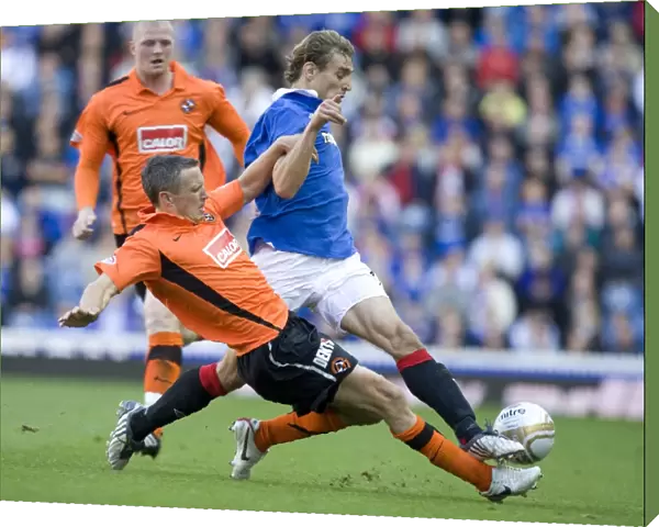 Intense Clash at Ibrox: Jelavic vs. Severin - Rangers 4-0 Victory over Dundee United