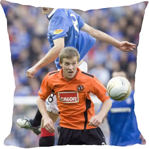Rangers Jelavic Scores Spectacular Goal Against Dundee United's Dixon in 4-0 Ibrox Victory