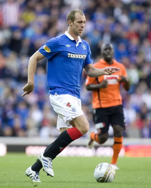 Steven Whittaker's Stellar Performance: Rangers 4-0 Dundee United in the Clydesdale Bank Scottish Premier League at Ibrox Stadium