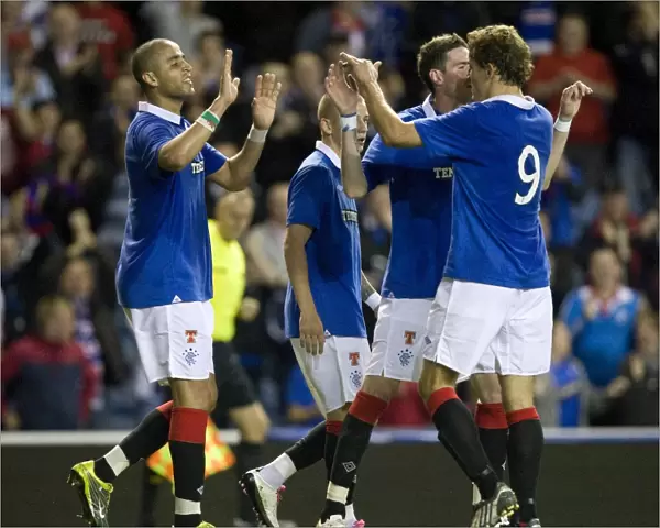 Rangers Glory: Majid Bougherra and Teammates Seven-Goal Triumph over Dunfermline in CIS Insurance Cup