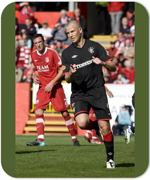 Kenny Miller's Dramatic Penalty: Rangers Comeback at Pittodrie Stadium (Clydesdale Bank Premier League) - Aberdeen 3-2 Rangers