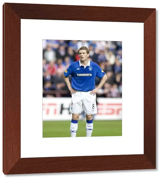 Steven Davis Scores the Game-Winning Goal: Heart of Midlothian vs Rangers in the Scottish Premier League (1-2)