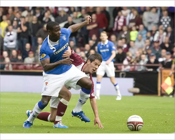 Rangers vs Hearts: A Pivotal Moment - Maurice Edu vs Ian Black in the Clydesdale Bank Scottish Premier League