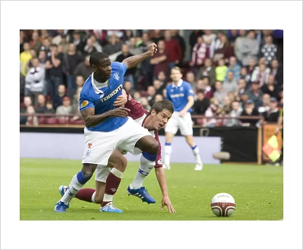 Rangers vs Hearts: A Pivotal Moment - Maurice Edu vs Ian Black in the Clydesdale Bank Scottish Premier League