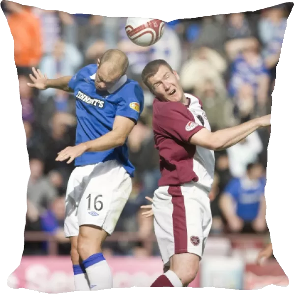 Steven Whittaker vs. Kevin Kyle: A Clash in the Clydesdale Bank Scottish Premier League - Heart of Midlothian vs. Rangers (1-2)