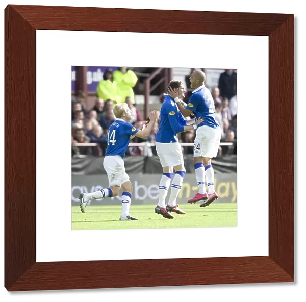 Rangers Lafferty and Bougherra: Celebrating Glory with a 2-1 SPL Win over Heart of Midlothian