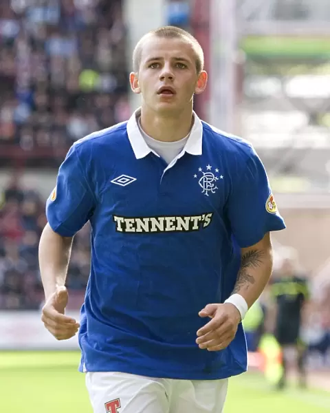 Thrilling Victory: Vladimir Weiss Scores the Decider for Rangers at Tynecastle (1-2)