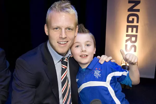 Rangers Football Club: Steven Naismith Connects with a Fan at the 2010 Junior AGM
