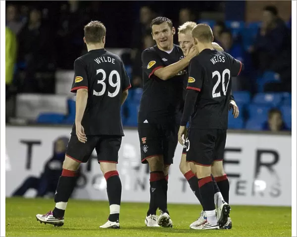 Rangers Steven Naismith and Teammates Celebrate Double Goal Lead Over Kilmarnock in CIS Insurance Cup Quarterfinal at Rugby Park