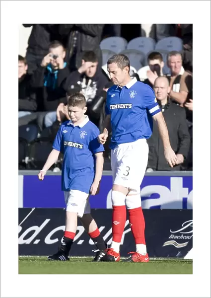 Rangers Triumph: David Weir and the Mascot: Celebrating a 3-1 Victory over St. Mirren in the Scottish Premier League