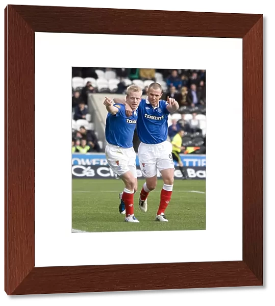 Rangers Naismith and Miller: A Dynamic Duo Celebrates a Goal Against St. Mirren (3-1)