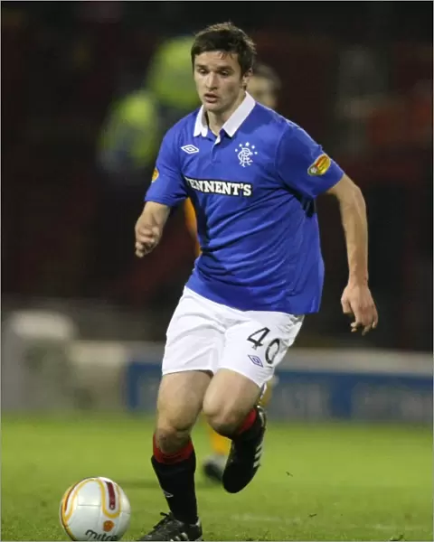 Rangers Jamie Ness Scores the Decisive Goal in 1-4 Crush of Motherwell (Scottish Premier League)
