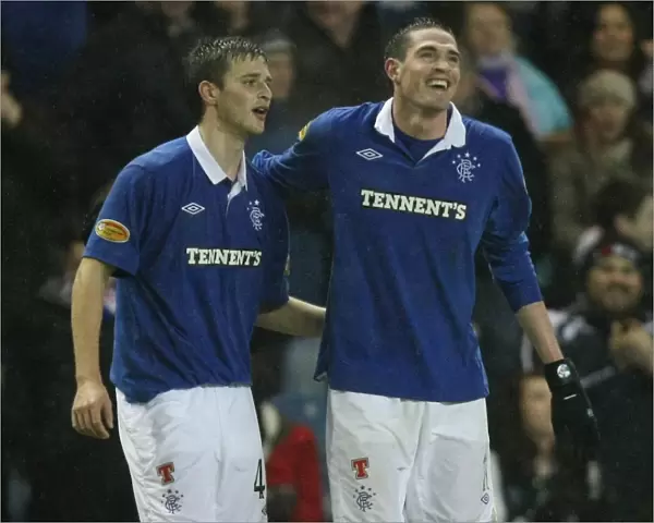 Rangers Kyle Lafferty and Jamie Ness: Celebrating Goals in Rangers 3-0 Victory over Kilmarnock (Scottish Cup Fourth Round, Ibrox)