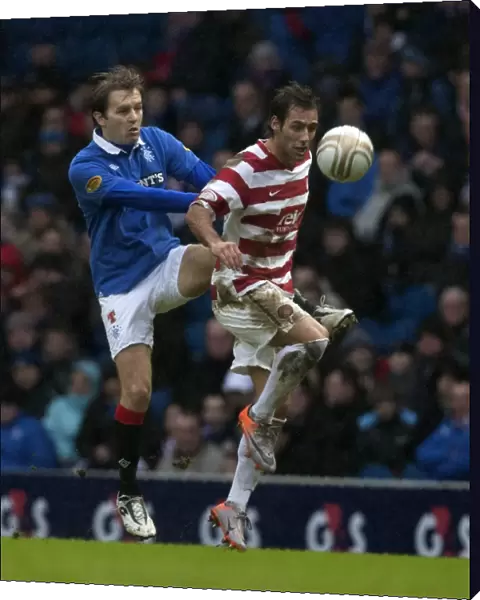 Rangers vs. Hamilton: Sasa Papac's Intense Battle for the Ball in a 4-0 Clydesdale Bank Premier League Victory