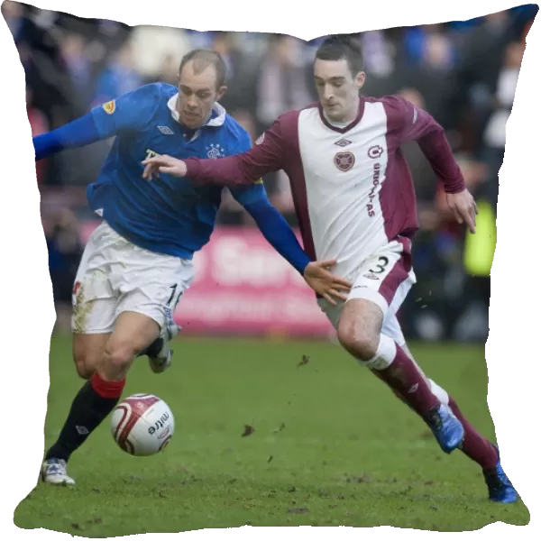 Battle for the Ball: Whittaker vs. Wallace in Hearts vs. Rangers Rivalry (1-0) at Tynecastle