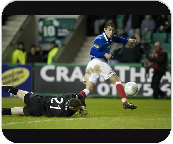 Jelavic's Stunning Scores Twice: Rangers Lead 2-0 Over Hibernian (Nikica Jelavic Rounded Graeme Smith for Second Goal)