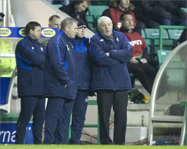 Rangers Triumph: McCoist, McDowall, and Smith Celebrate 0-2 Victory Over Hibernian at Easter Road Stadium (Scottish Premier League)