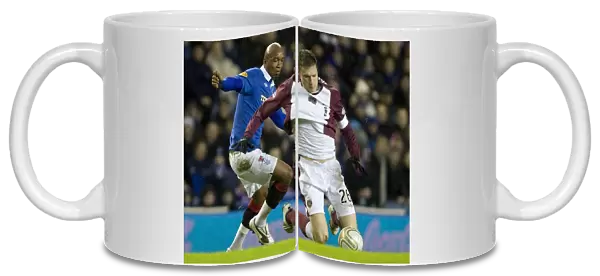 Intense Rivalry: Diouf vs Zaliukas Clash at Ibrox - Rangers vs Hearts (1-0)