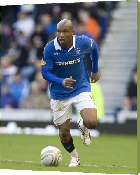 El Hadji Diouf's Brace Leads Rangers to Dominant 6-0 Victory over Motherwell at Ibrox