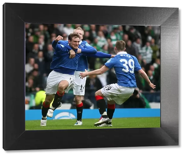 Rangers Triumph: Jelavic, Naismith, and Wylde's Co-operative Cup Victory Celebration Over Celtic (2011)