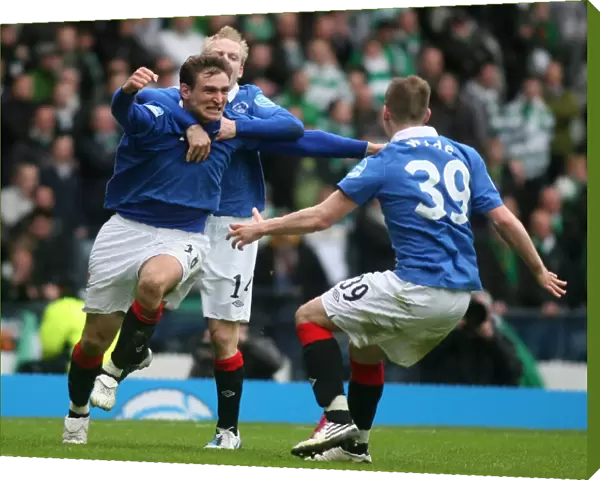 Rangers Triumph: Jelavic, Naismith, and Wylde's Co-operative Cup Victory Celebration Over Celtic (2011)