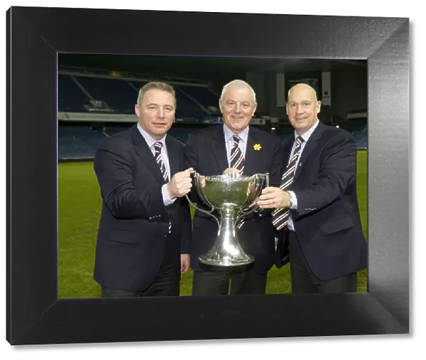 Triumphant Co-op Cup Victory: McCoist, Smith, and McDowall's Unforgettable Moment at Ibrox Stadium (2011)