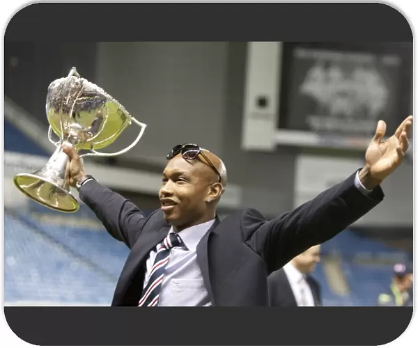 El Hadj Diouf's Triumphant Return: Rangers Football Club Wins Co-operative Cup (2011)