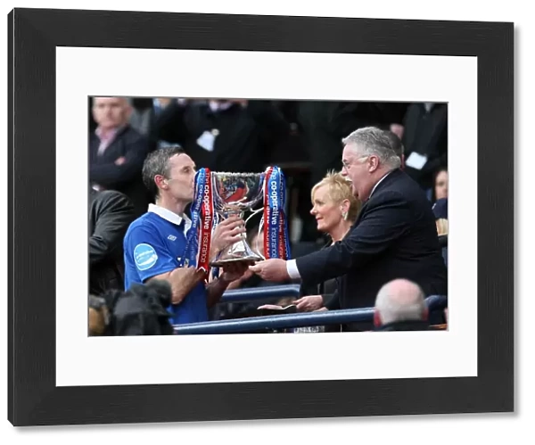 Rangers Football Club: David Weir's Triumphant Co-op Cup Victory (2011) - Celebrating with the Trophy