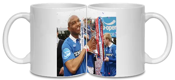 Diouf's Triumph: Rangers Co-operative Cup Victory Over Celtic at Hampden Stadium (2011)