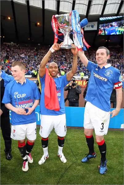 Rangers FC: Triumphant Trio - Diouf, Wylde, and Weir Lift the Co-operative Insurance Cup (2011)