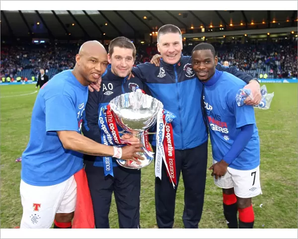 Rangers FC: Celebrating Co-operative Cup Victory with Diouf, Owen, Stewart, and Edu