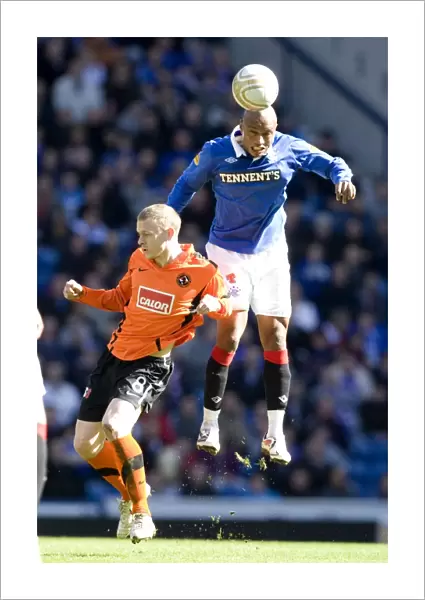 Thrilling 3-2 Upset: Diouf vs Robertson at Ibrox - Dundee United's Victory Over Rangers