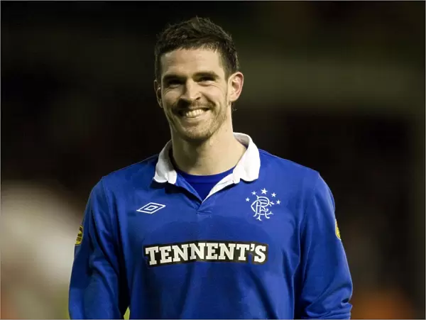 Kyle Lafferty's Game-Winning Goal: Rangers Secure Victory Over Aberdeen in Scottish Premier League at Pittodrie Stadium