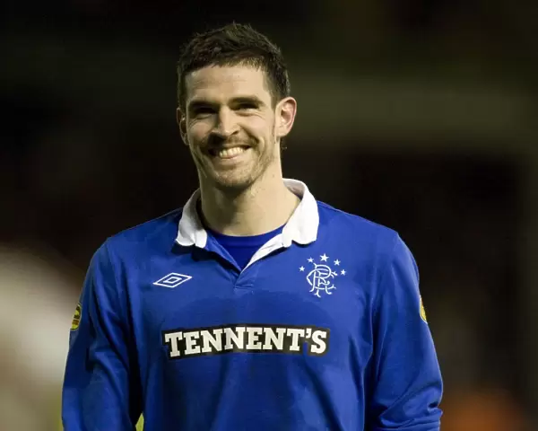 Kyle Lafferty's Game-Winning Goal: Rangers Secure Victory Over Aberdeen in Scottish Premier League at Pittodrie Stadium