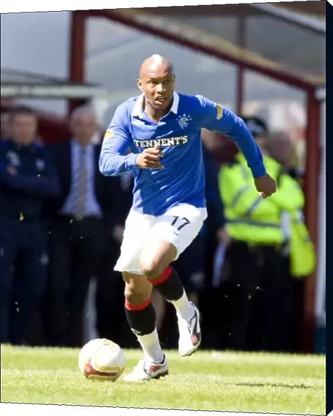 Five-Star Diouf: Rangers Dominance - 5-0 Over Motherwell in Scottish Premier League