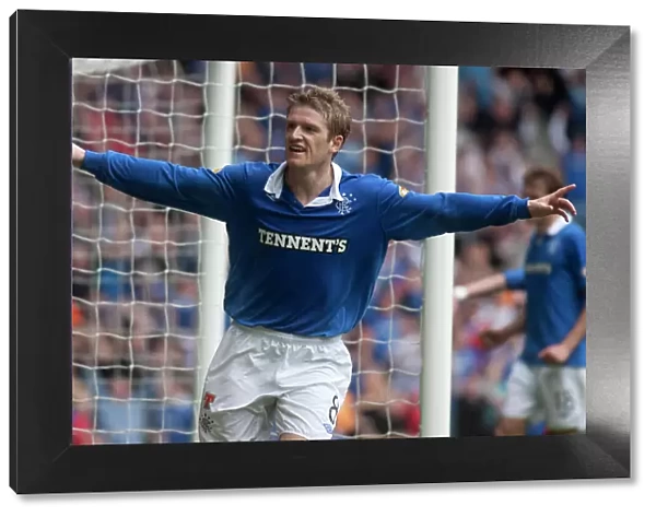 Rangers Steven Davis: Triumphant Third Goal - 4-0 Victory Over Heart of Midlothian in the Scottish Premier League at Ibrox