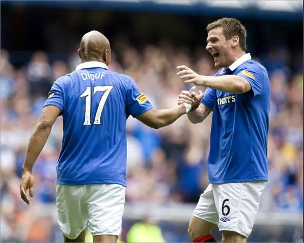 Rangers El Hadji Diouf and Lee McCulloch: Celebrating a 4-0 Victory Over Heart of Midlothian at Ibrox