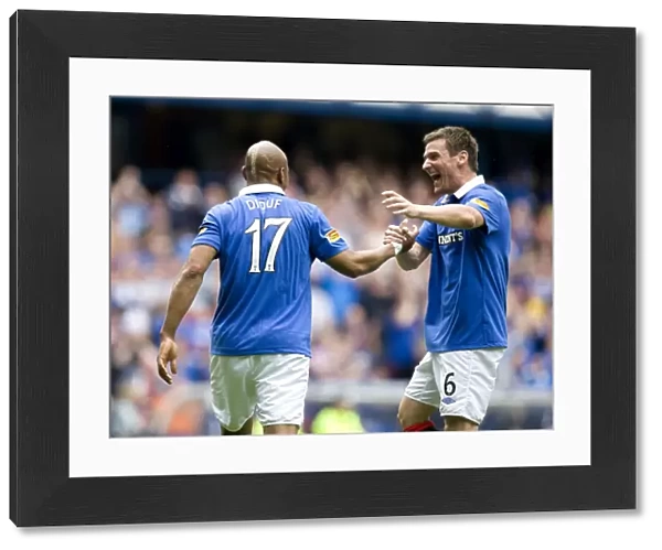 Rangers El Hadji Diouf and Lee McCulloch: Celebrating a 4-0 Victory Over Heart of Midlothian at Ibrox