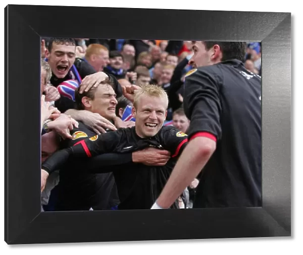 Rangers Football Club: Triumphant Triple Reunion - Celebrating SPL Victory with Kyle Lafferty, Stevie Naismith, and Nikica Jelavic at Rugby Park (2010-11)