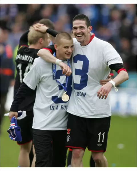 Rangers Football Club: Champions Kyle Lafferty and Vladimir Weiss Celebrate SPL Victory at Rugby Park